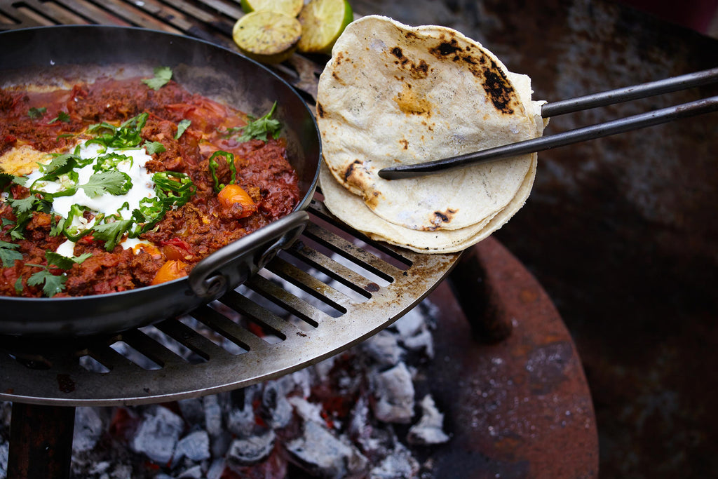 Fire cooked venison mince chilli cooked over fire with Cool Company tortillas fire cooked tacos  